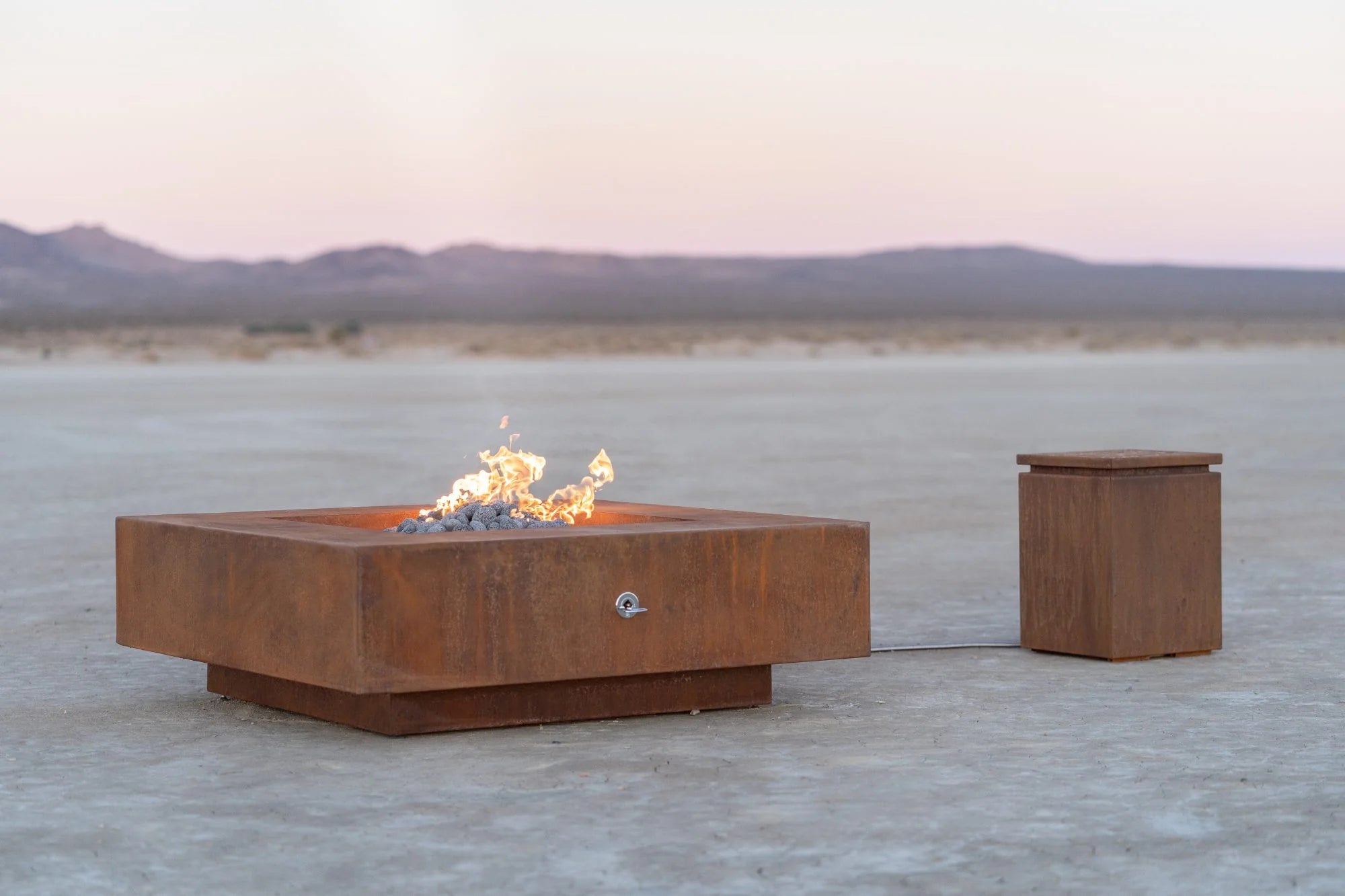 The Outdoor Plus Square Cabo Fire Pit in Corten Steel